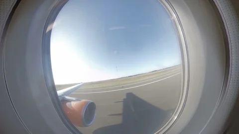 Dynamic fisheye view onboard plane as it takes off from runway Stock Footage 118253414