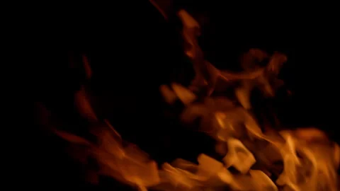 Dynamic Flames Against a Dark Background, Evoking Intense and Vibrant Imagery of Stock Footage 311814212
