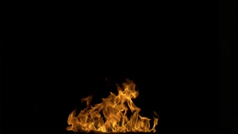 Dynamic Flames Against a Dark Background Captured in High Contrast Photograph Video stock 341920340
