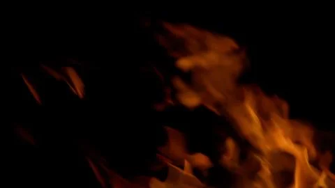 Dynamic Flames Against a Dark Background, Evoking Intense and Vibrant Imagery of Stock Photos