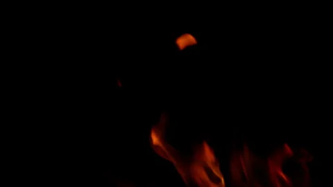 Dynamic Flames Dance in the Dark Enveloping the Night, Creating a Hypnotic Atmos Stock Footage 311814709
