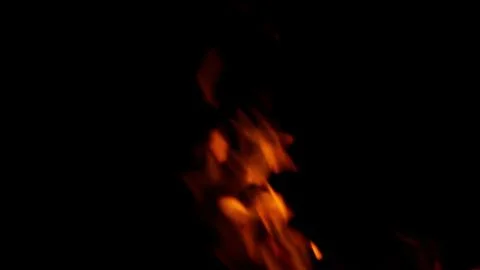Dynamic Flames Dance in the Dark Enveloping the Night, Creating a Hypnotic Atmos Stock Photos