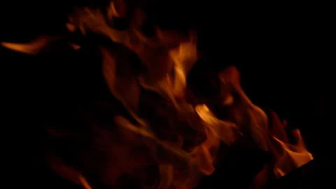 Dynamic Flames Gracefully Dancing in the Darkness, Creating a Mesmerizing Displa Stock Footage 311814331