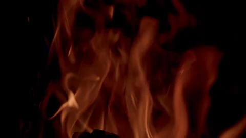 Dynamic Flames Gracefully Dancing in the Embracing Darkness of the Night Sky Abo Stock Footage 310570912