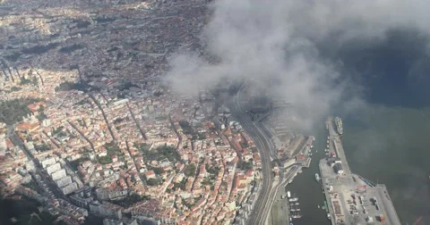 Dynamic flight over cloudy city, Lisbon Stock Footage 50047272