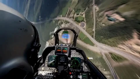 Dynamic flight simulation in jet fighter cockpit showing high speed aerial .. Stock Footage 321948187