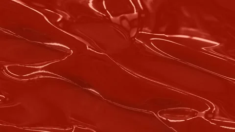 Dynamic Flow and Texture of Vivid Red Liquid Surface Captured in Two Distinct Stock Footage 316876050