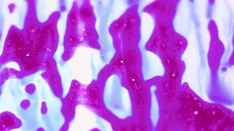 Dynamic Flow of Bright Oil Paints Over a White Canvas Stock Footage 266946668