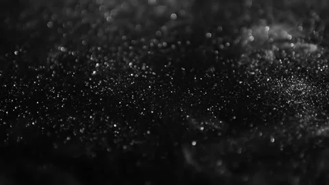 Dynamic flowing liquid gold particles in motion. Abstract metallic glitter textu 스톡 동영상 340450390