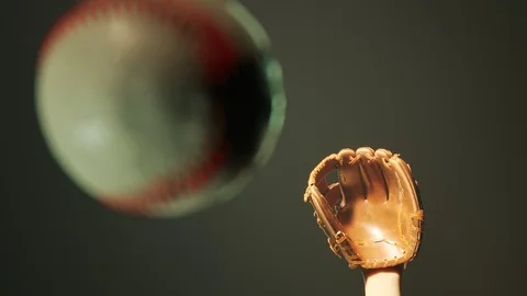 Dynamic flying baseball catch in the spotlight. Epic foggy slow motion shot 4KHD Stock Footage 110048280
