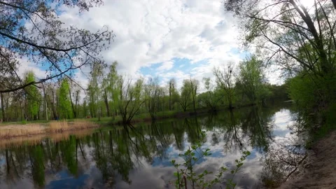 Dynamic footage of clouds over a river in northern Europe Stock Footage 193673657