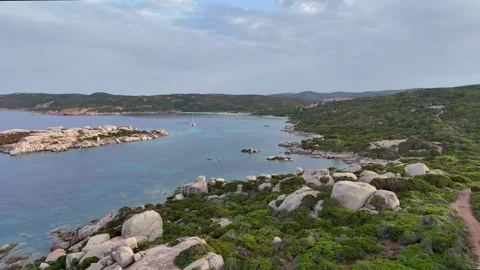 Dynamic Forward Drone Flying Between Rocks and Waves Sardegna Vídeo Stock 333729111