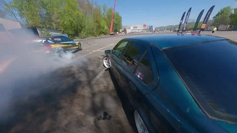 Dynamic FPV Drift Battle With Close Proximity Shots Stock Footage 328473558