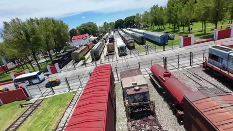 Dynamic FPV Drone Panorama of Industrial Train Yard and Freight Cars Stock Footage 342549572