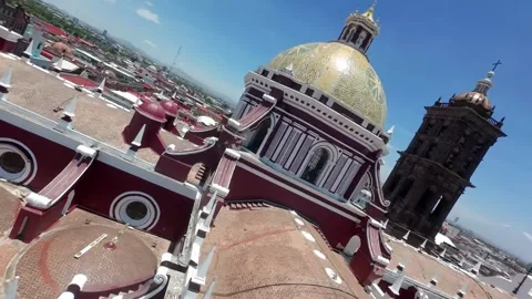 Dynamic FPV Drone Pass Skimming Over Puebla Cathedral Roofs and Cupolas Stock Footage 342540468
