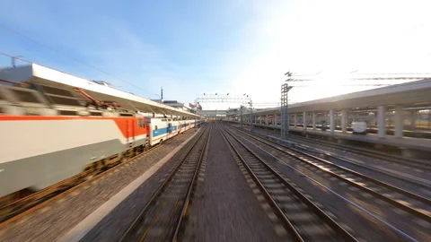 Dynamic FPV drone view of Vk Vostochnyy, sunny day at train station of Moscow Stock Footage 273576881