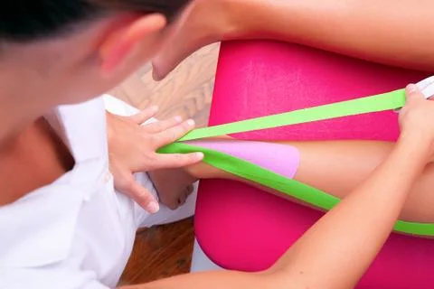 Dynamic functional bandage with taping Stockfoto's