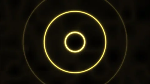 Dynamic glowing circles on a dark background with light Stock Footage 339020836