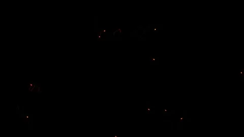 Dynamic Glowing Orange Sparks and Embers on Black Background Vídeo Stock 344621584