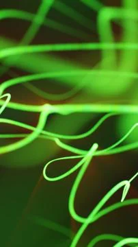 Dynamic green glowing light trails creating energetic abstract motion across  Stock Illustration