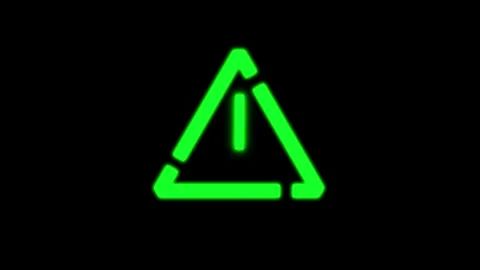 A dynamic green neon triangular warning symbol flashes and rotates on a sta.. Видео 346490771
