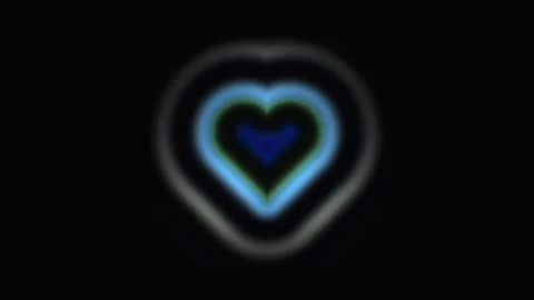 Dynamic heart shape glow on dark background for creative Stock Footage 338188552