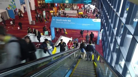 Dynamic hectic hyperlapse walk through CES 2017 trade show floor in Las Vegas Stock Footage 73438231