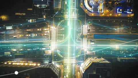 Dynamic hyper lapse of a busy city intersection at night with digital overlays Stock Footage 276106299