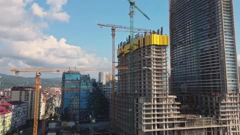 Dynamic hyperlapse of high rise building construction in Batumi with cranes.. Stock Footage 318297166