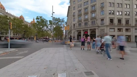 Dynamic hyperlapse perspective of a busy intersection in barcelona, spain, with Video stock 347335821