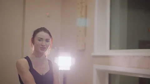 Dynamic indoor exercise with vibrant lighting and energetic movement, Athletic Stock Footage 346378937