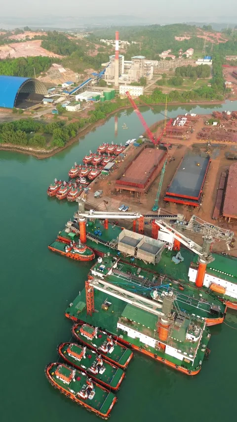 Dynamic Industrial Port Landscape Showcasing Large-Scale Maritime Vessels a.. Stock Footage 337281152