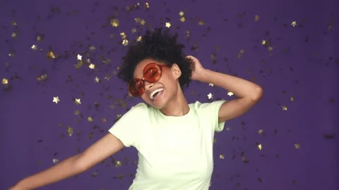 Dynamic lady dance floor enjoy fall confetti isolated violet color background Stock Footage 165878581