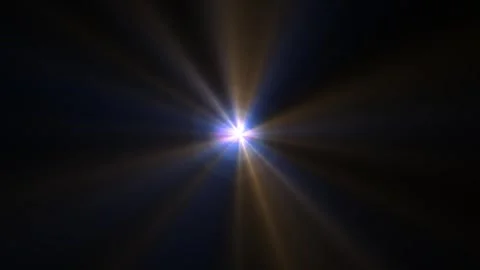 Dynamic Light Rays with Bright Center and Abstract Color Effects in Dark Spac Stock Footage 345434038