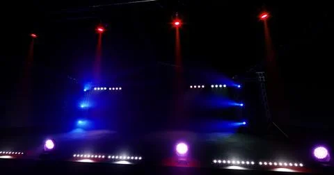 Dynamic lighting setup enhances stage performance for nighttime events Stock Illustration