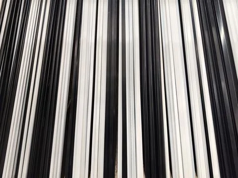 Dynamic lines create a striking visual rhythm in black and white patterns Stock Photos