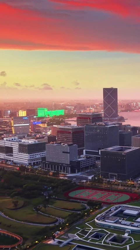 Dynamic Lingang Cityscape: Sunset over Dishui Lake, Shanghai Stock Footage 331285610