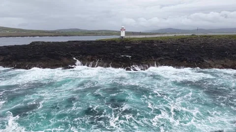 Dynamic low aerial shot of Atlantic waves near Ballyglass, Ireland. Stock Footage 342730345