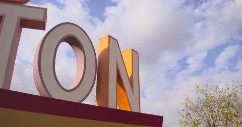 Dynamic Low-Angle Shot of Iconic 'We Love Houston' Sign in Houston Stock Footage 303784449