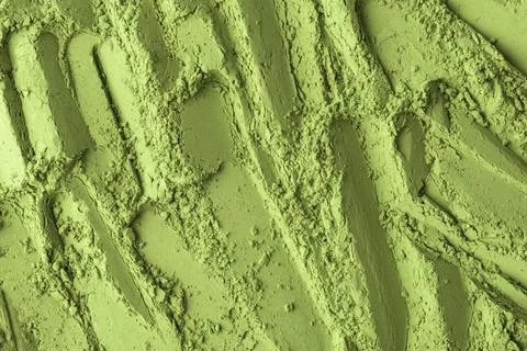 Dynamic macro pattern of green matcha powder with vertical grooves, versatile 스톡 사진