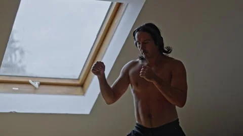 Dynamic Martial Arts Practice in Natural Light A Unique Blend of Movement and Stock Footage 302659018