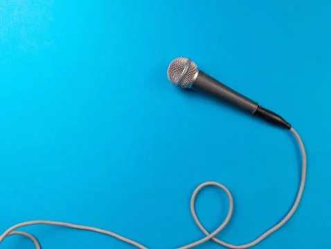 Dynamic microphone with a long gray wire Stock Photos