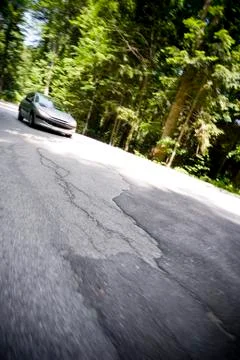 Dynamic motion blur of close car passing by Stock Photos