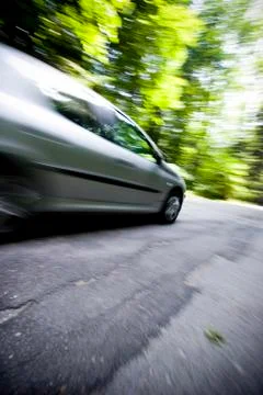 Dynamic motion blur of close car passing by Stock Photos