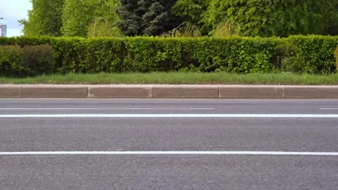Dynamic motion blur effect of cyclist riding bicycle at high speed on asphalt Vidéo 347580039