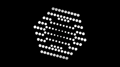 Dynamic motion of dotted hexagonal pattern in black and white visual display. Stock Footage 342754982