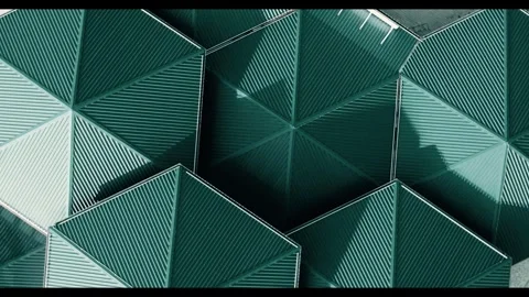 Dynamic motion over tessellated corrugated green geometric surface pattern Stock Footage 327518926