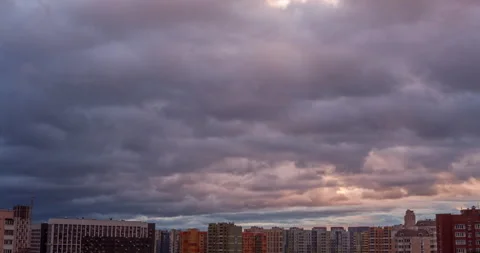 Dynamic movement of blue clouds over new modern city district. Time lapse Stock Footage 160589494