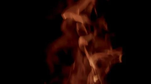 The Dynamic Movement of Flames Against a Dark Background Creates a Striking Visu Stock Photos
