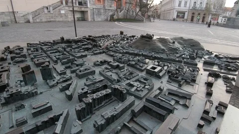 Dynamic moving close up over bronze mockup 3D map of Ljubljana city Stock Footage 127519712